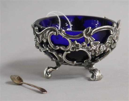 A Victorian pierced silver salt, The Angells, London, 1845 and a salt spoon.